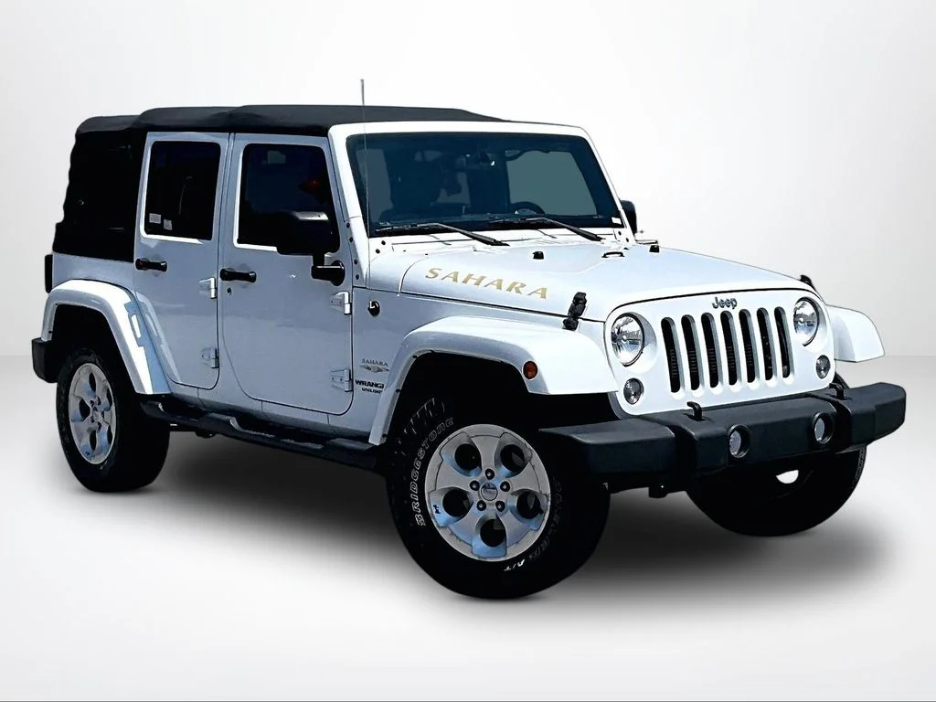 Used 2015 White Jeep Unlimited Sahara image 13
