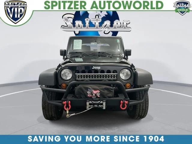 Used 2013 Black Clearcoat Jeep Sport image 4