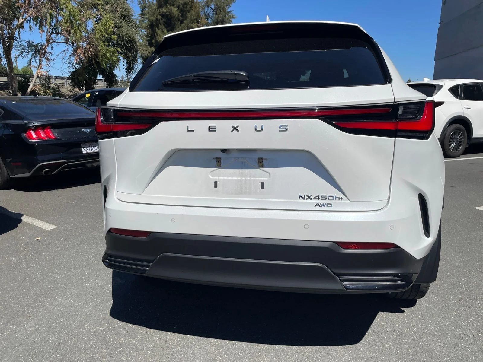 Used 2024 White Pearl Lexus 450h+ Luxury image 7