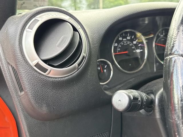 Used 2015 Orange Jeep Sahara image 27