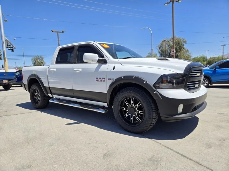 Used 2016 Bright White Clearcoat Ram Sport image 4