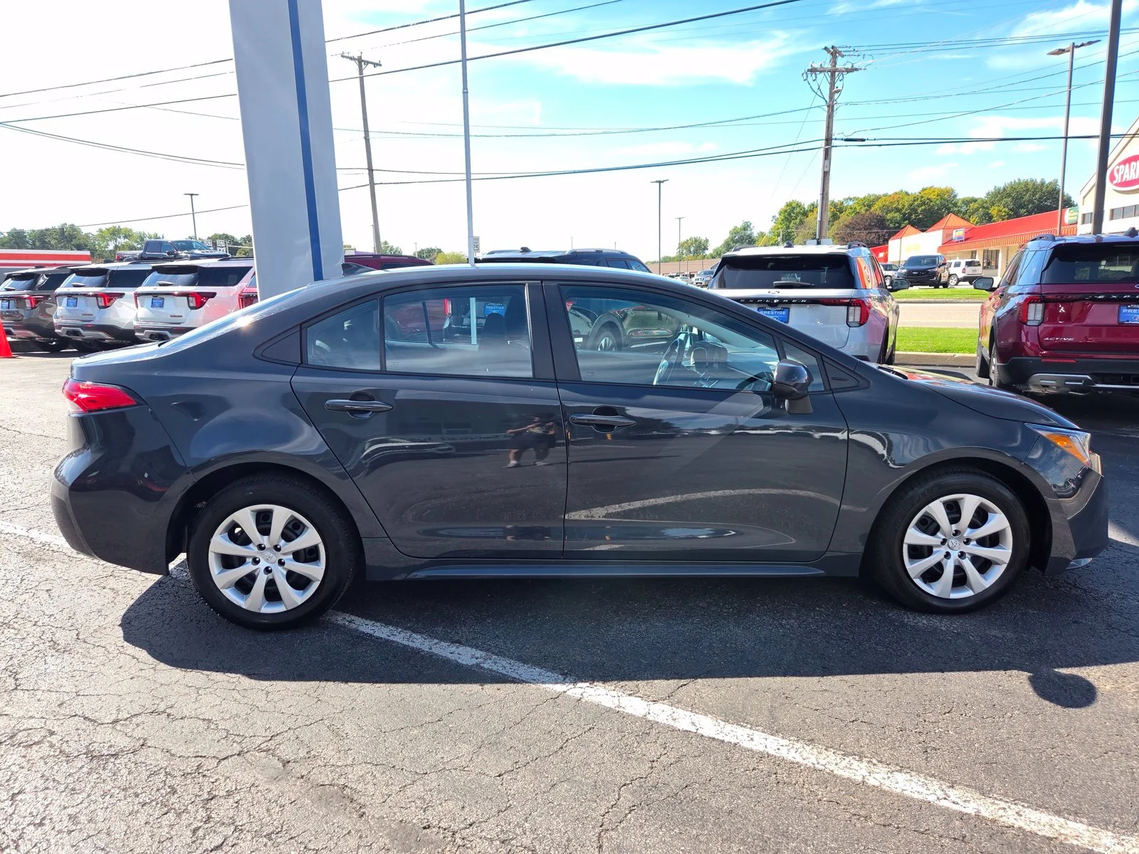 Used 2025 Black Toyota LE image 5