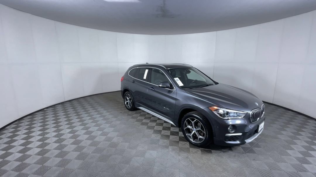 Used 2017 BMW X1 28i with VIN WBXHT3C37H5F69675 for sale in Aurora, CO