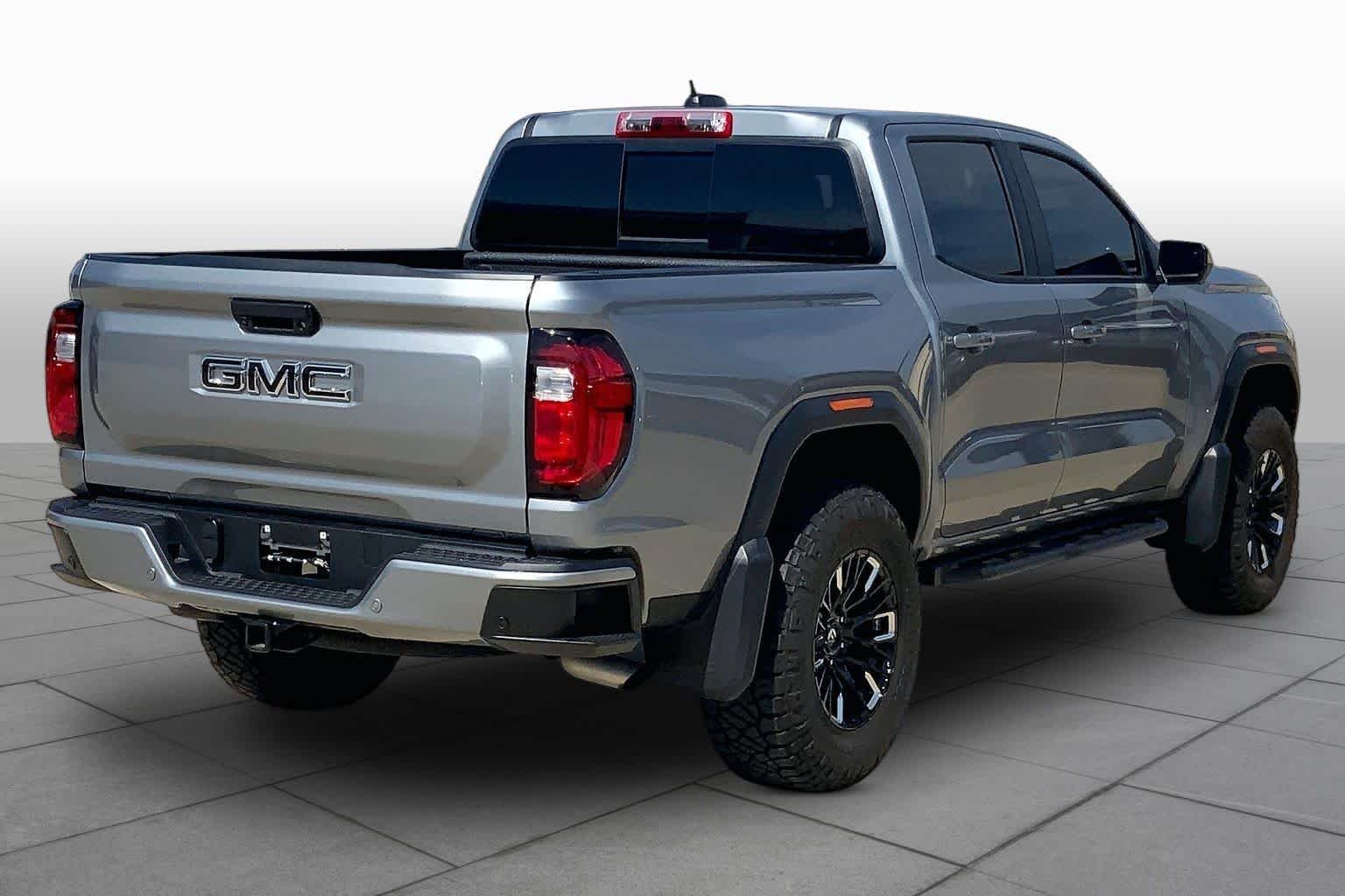 Used 2025 Sterling Metallic GMC 4WD AT4 image 12