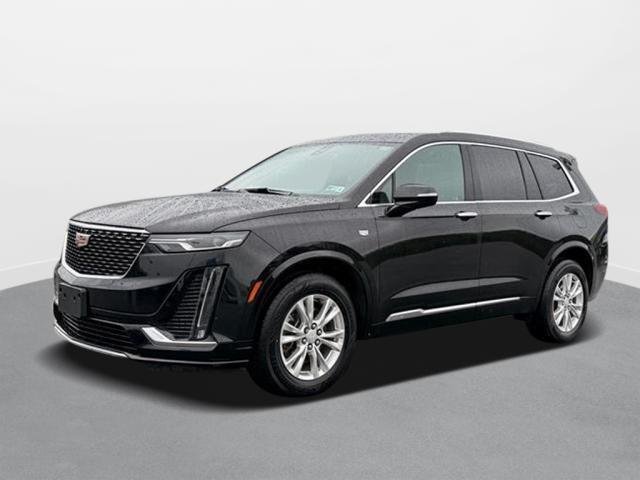 Used 2024 Stellar Black Metallic Cadillac AWD Luxury image 1