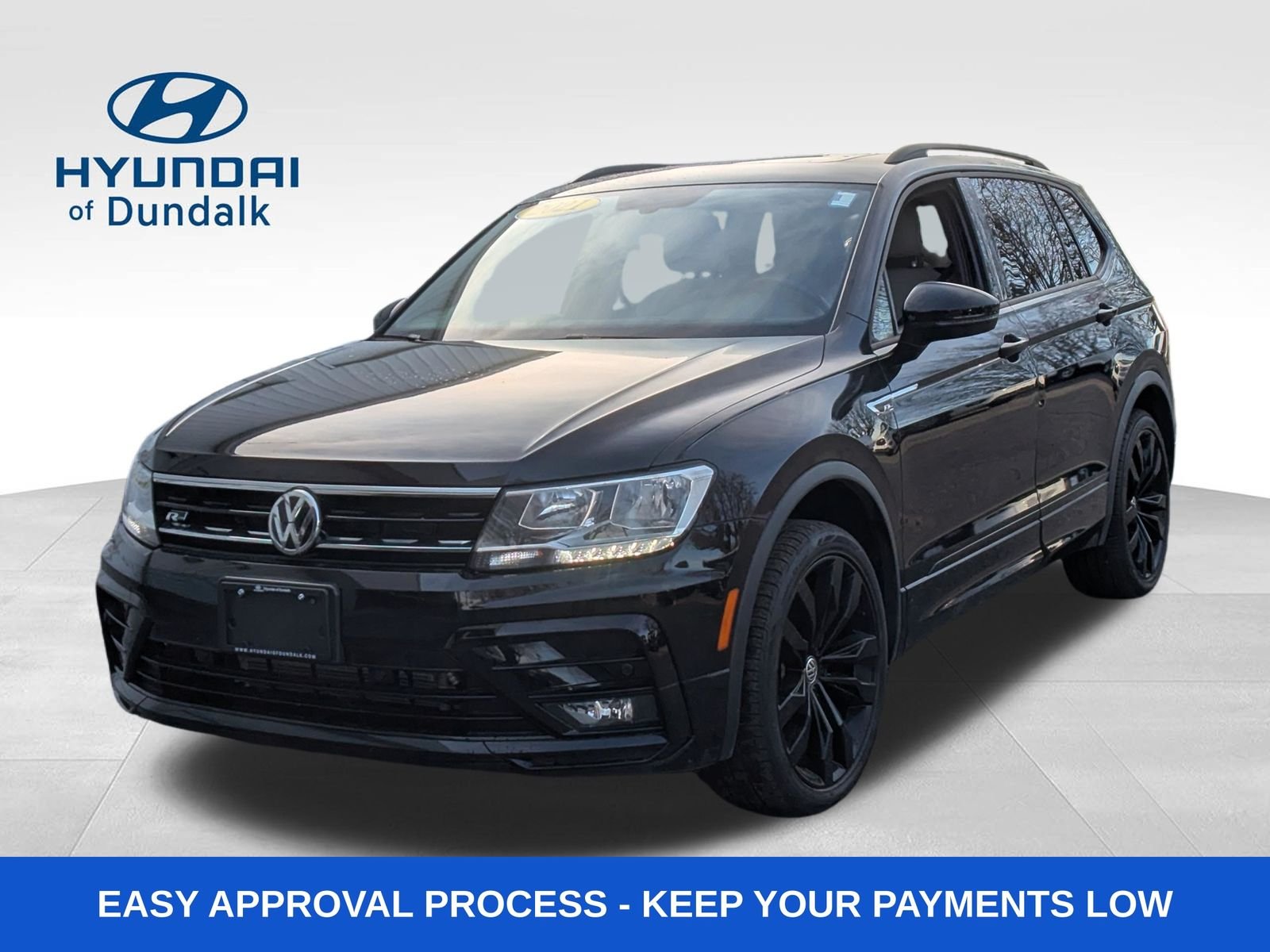 Used 2021 Black Volkswagen 2.0T SEL image 1