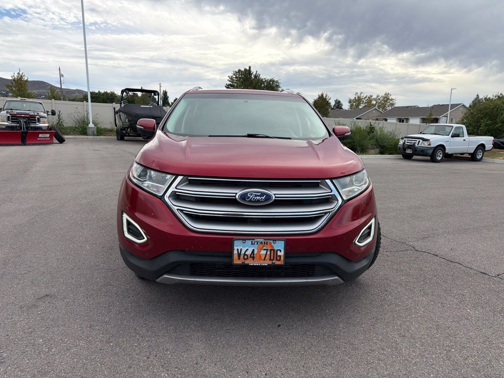 Used 2016 Ruby Red Metallic Ford Titanium image 2