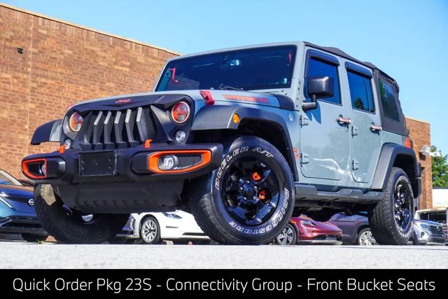 Used 2014 Gray Jeep Unlimited Sport image 1