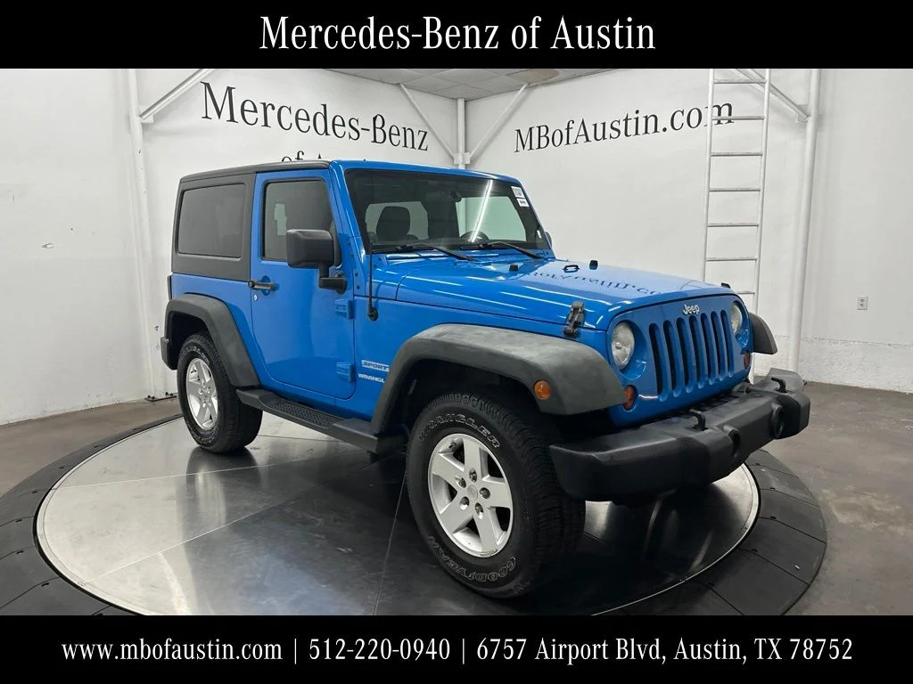 Used 2011 Blue Jeep Sport image 1