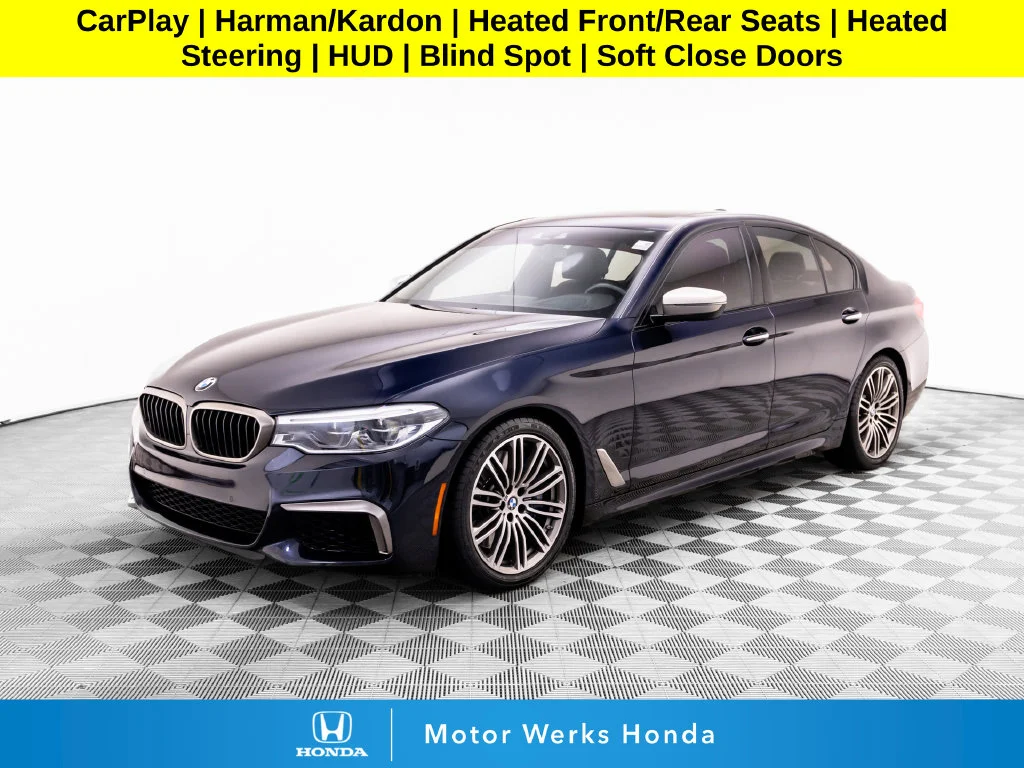 Used 2018 Black BMW M550i xDrive image 1