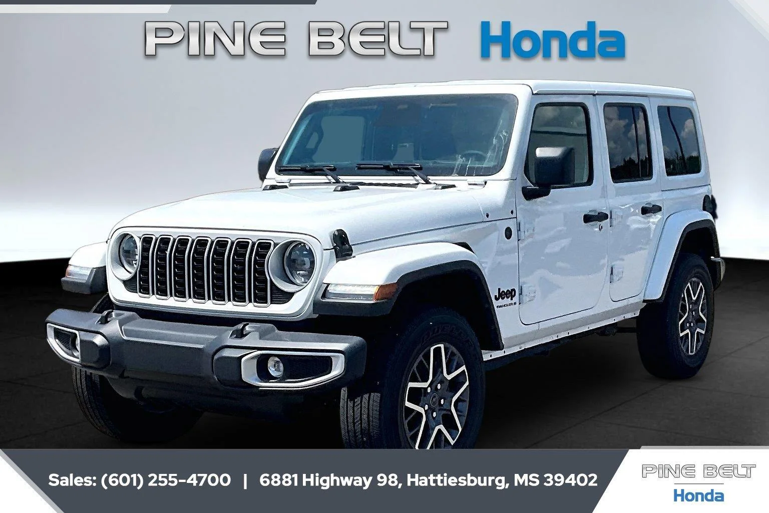 Used 2026 Bright White Clearcoat Jeep Sahara image 1