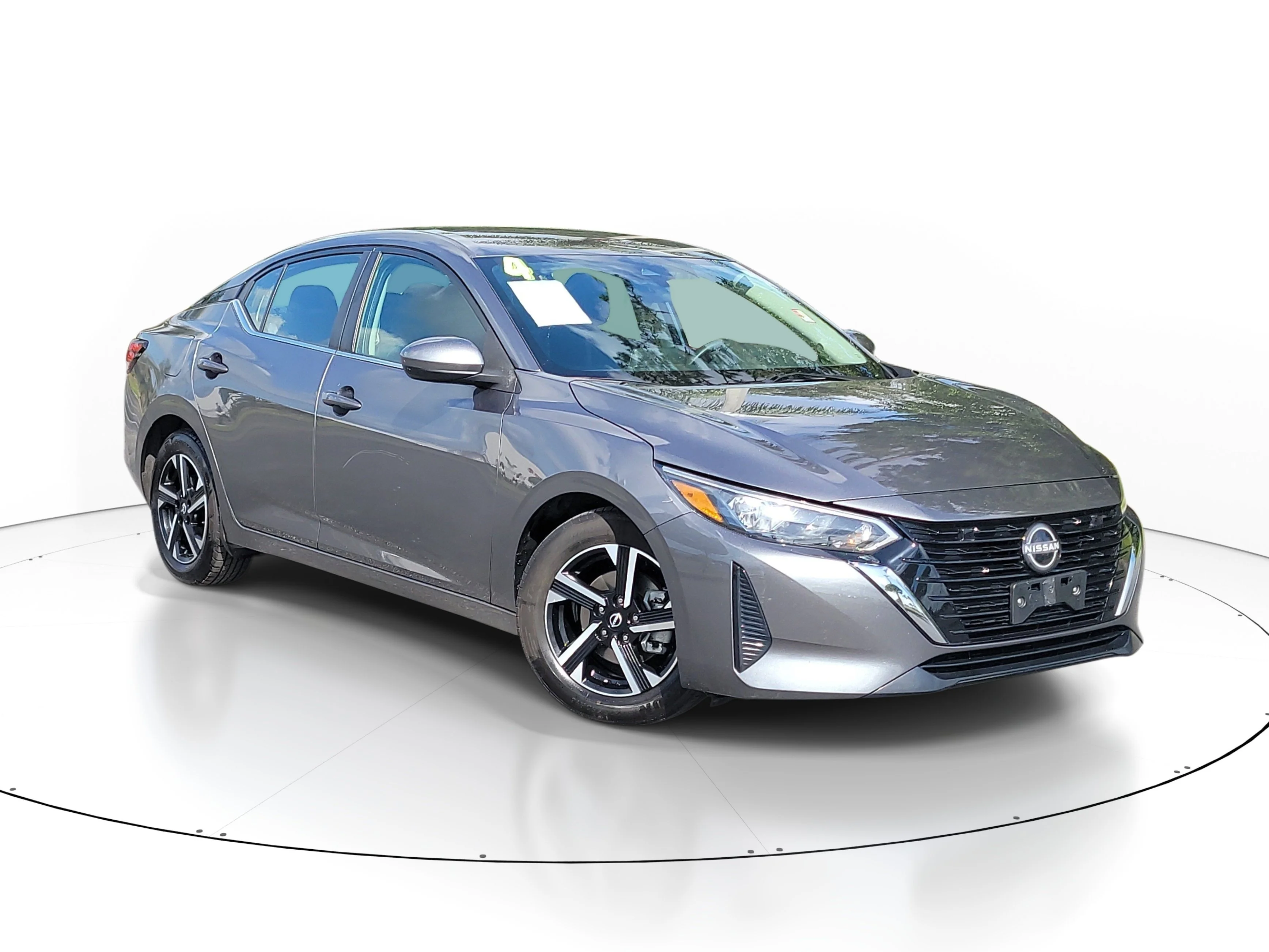 Used 2024 Gun Metallic Nissan SV image 1