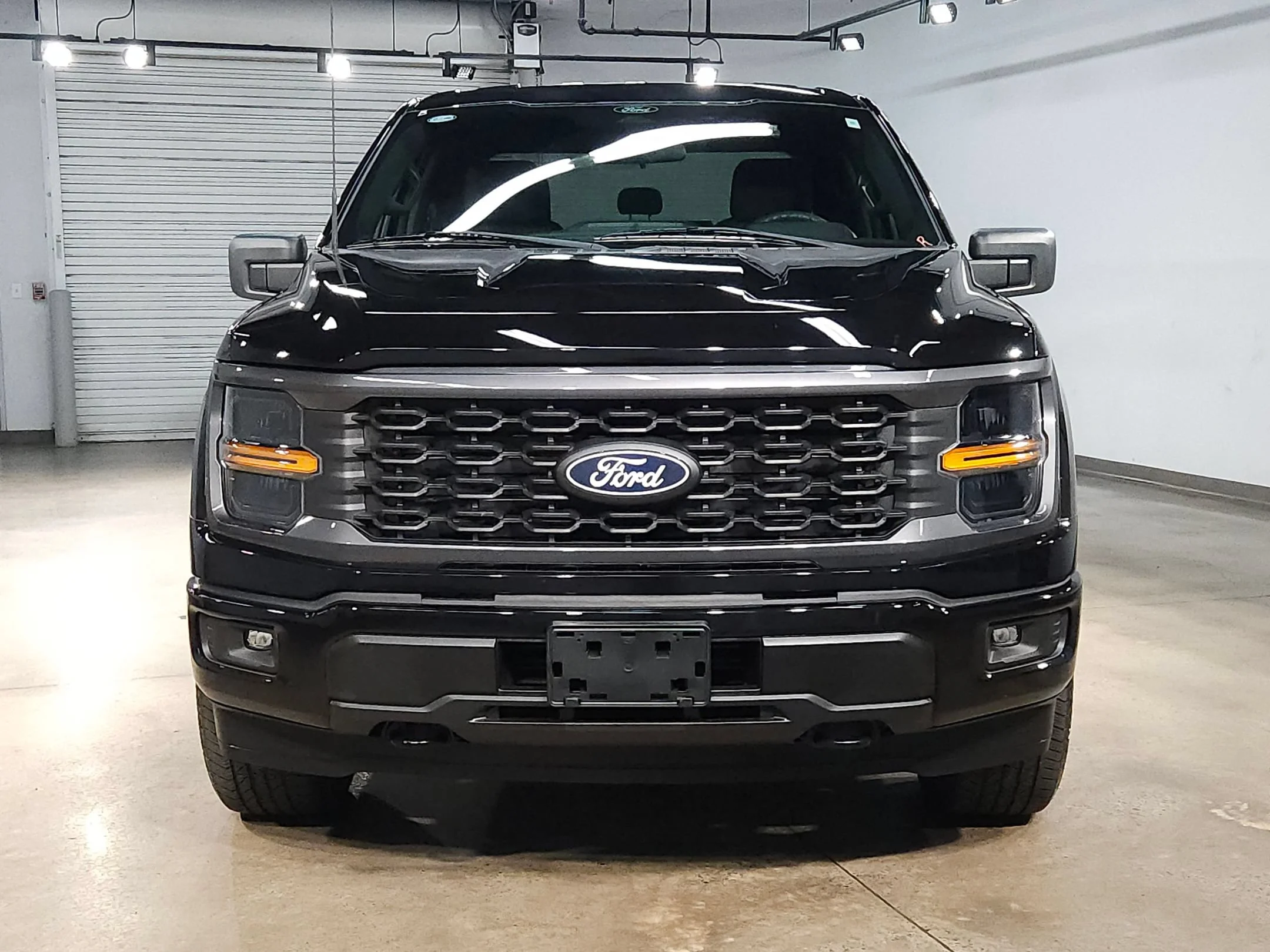 Used 2024 Agate Black Metallic Ford STX image 2