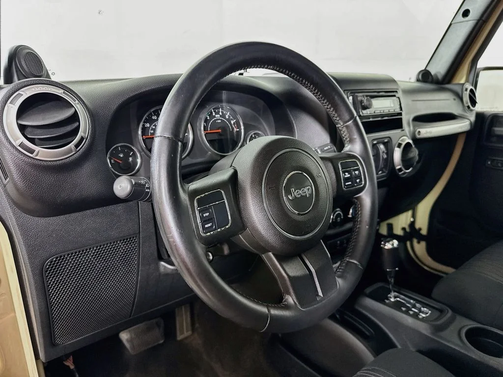 Used 2012 Beige Jeep Unlimited Sahara image 9