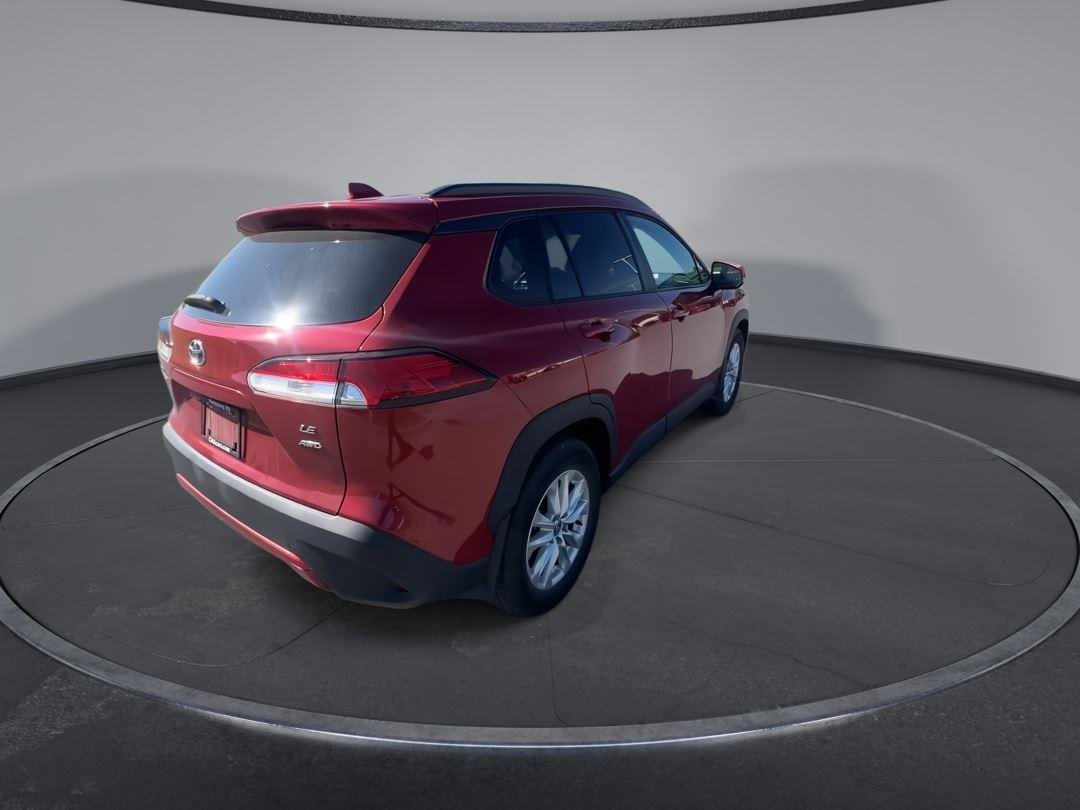 Used 2023 Barcelona Red Metallic Toyota LE image 8