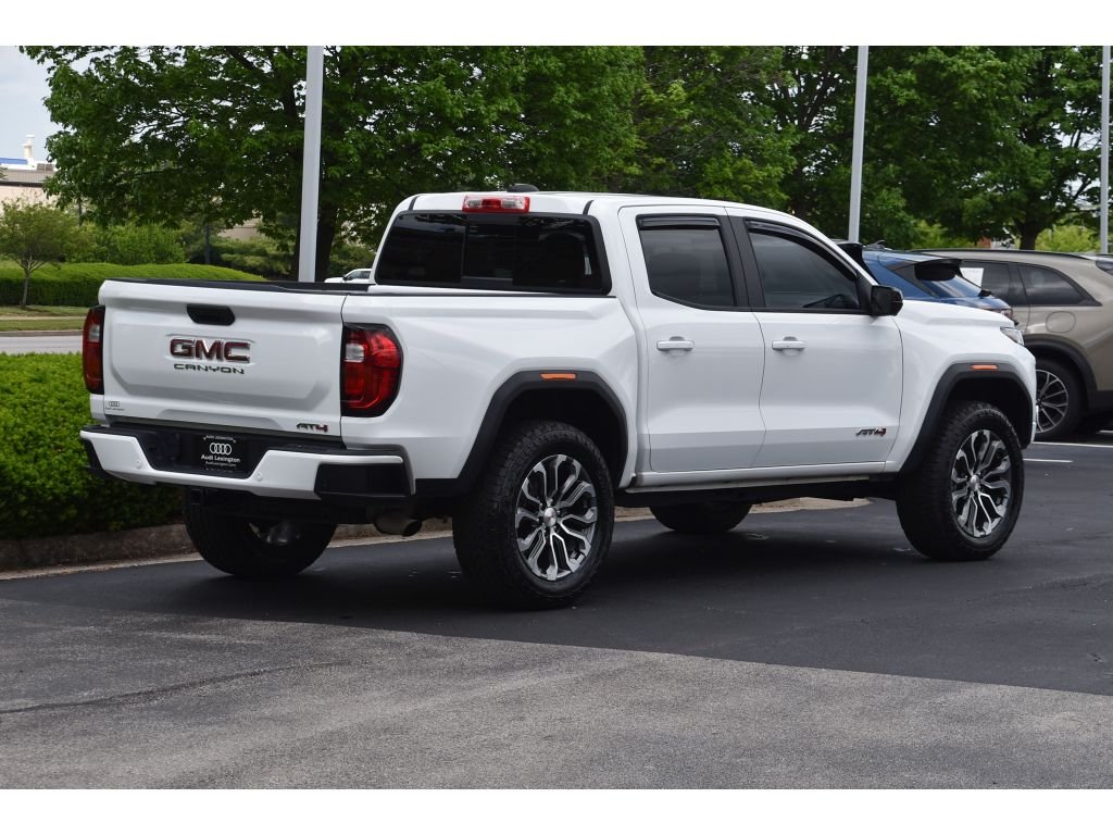Used 2024 Summit White GMC 4WD AT4 image 4