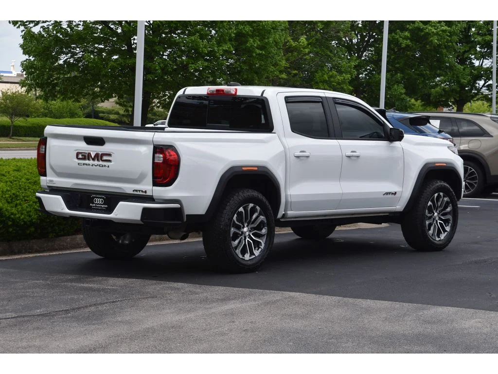 Used 2024 Summit White GMC 4WD AT4 image 4