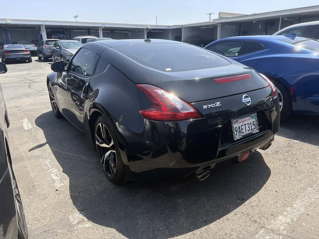 Used 2020 Magnetic Black Pearl Nissan Sport Touring image 5