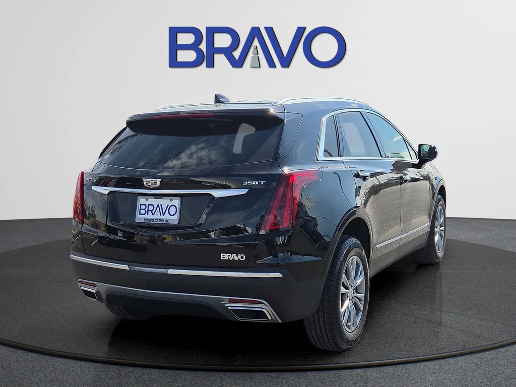 Used 2023 STELLAR BLACK METALLIC Cadillac FWD Premium Luxury image 4