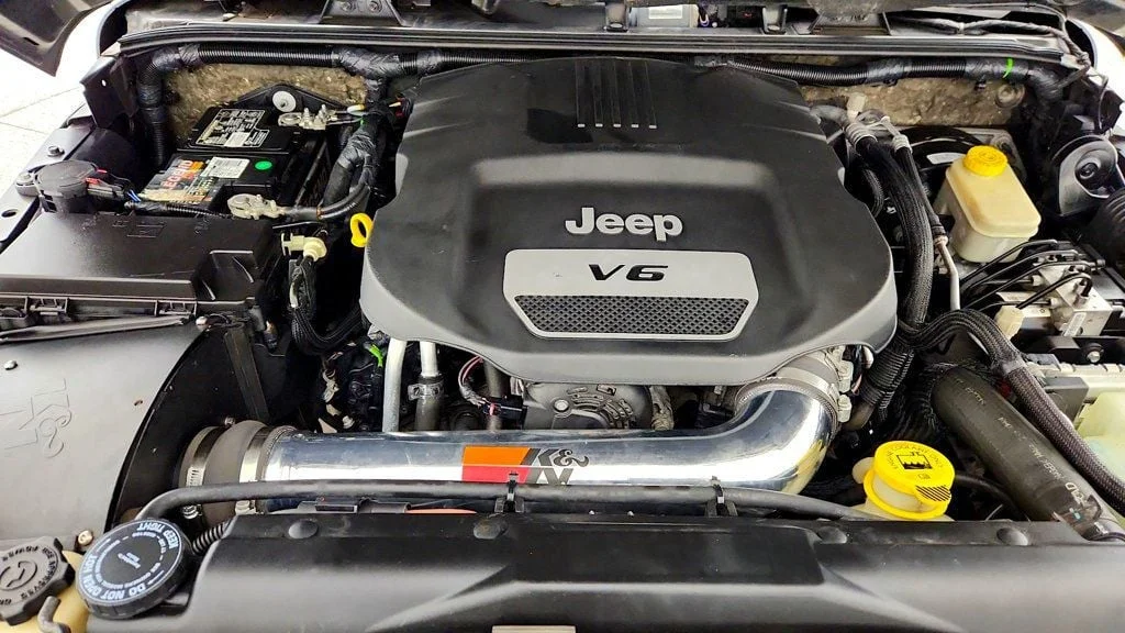Used 2017 Granite Crystal Metallic Clearcoat Jeep Sahara 4x4 w/ Heated Seats, Remote Start & Connectivity Pkg image 26
