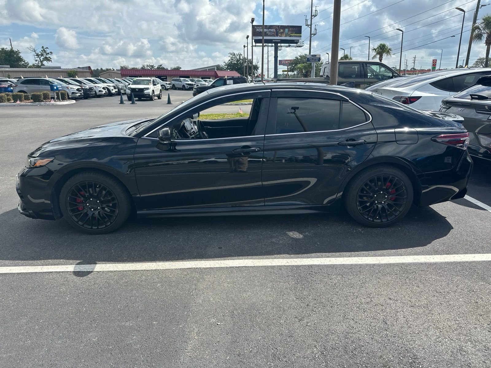 Used 2023 Midnight Black Metallic Toyota SE image 2