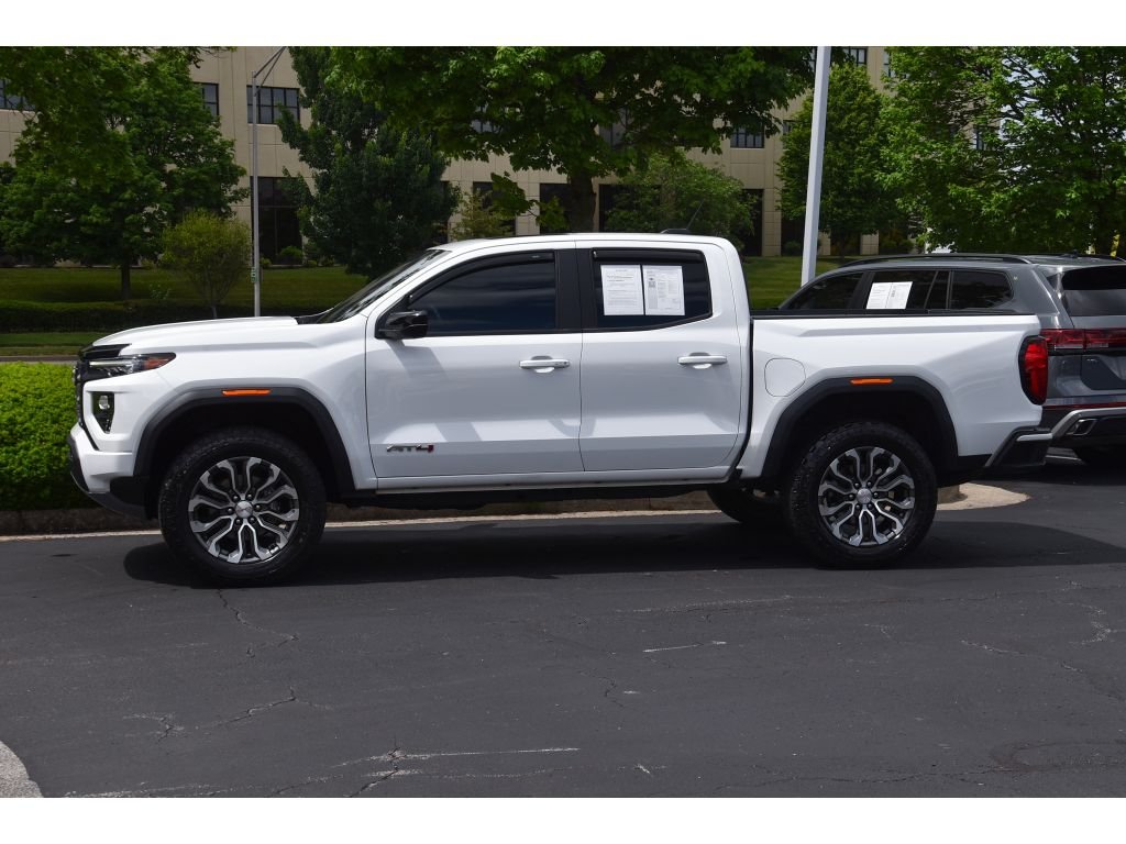 Used 2024 Summit White GMC 4WD AT4 image 6