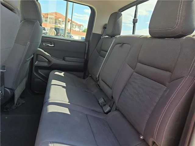 Used 2022 Red Alert Nissan SV (A9) 4x2 Crew Cab 5 ft. box 126 in. WB image 12