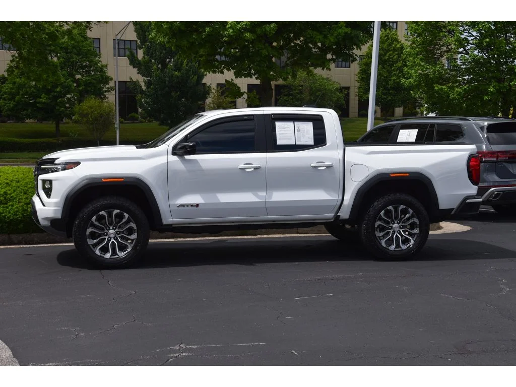 Used 2024 Summit White GMC 4WD AT4 image 6