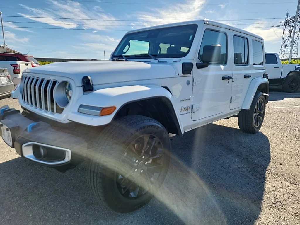 Used 2024 White Jeep Sahara 4xe image 1