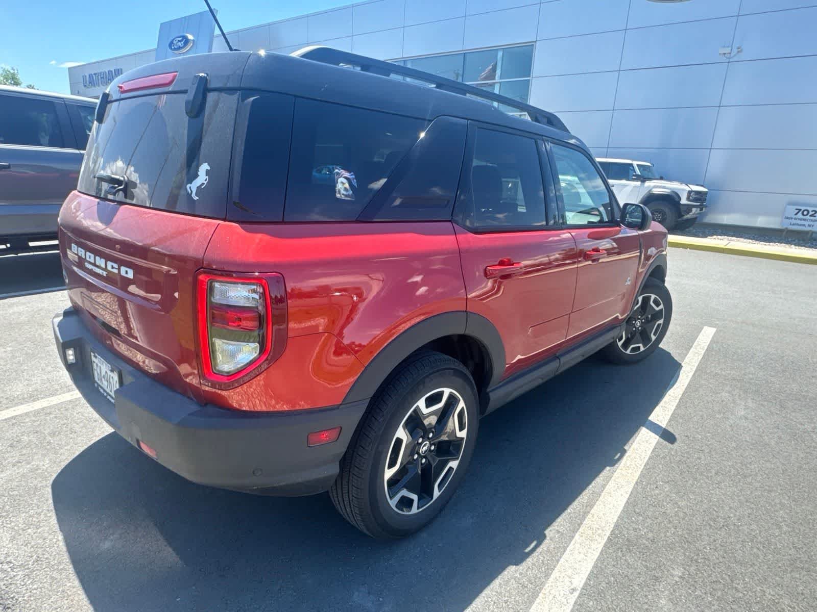 Used 2024 Hot Pepper Red Metallic Tinted Clearcoat Ford Outer Banks image 2