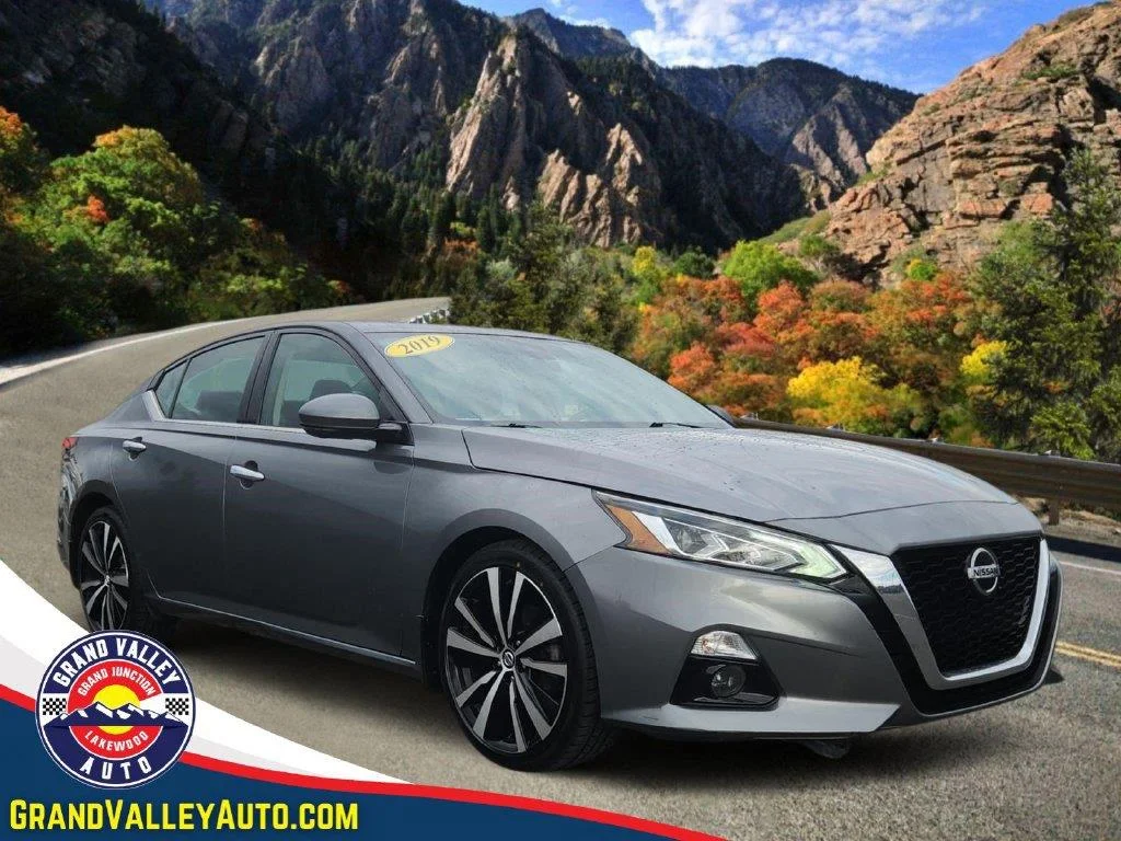 Used 2019 Gun Metallic Nissan 2.5 Platinum image 1