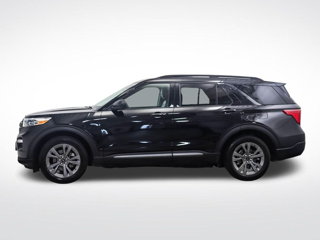 Used 2021 Ford Explorer XLT with VIN 1FMSK8DH8MGA59744 for sale in Minneapolis, Minnesota