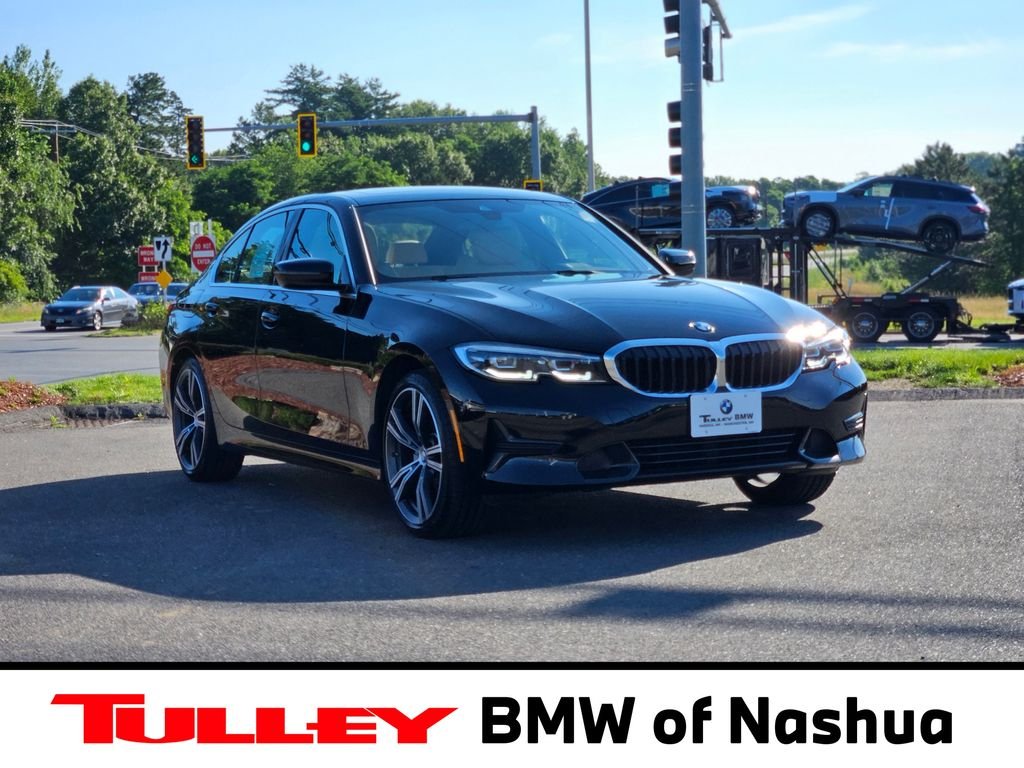 Used 2021 Jet Black BMW 330i xDrive image 1