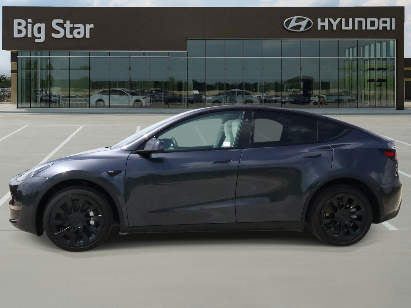 Used 2024 Tesla Model Y Long Range with VIN 7SAYGDEE7RA220888 for sale in Friendswood, TX