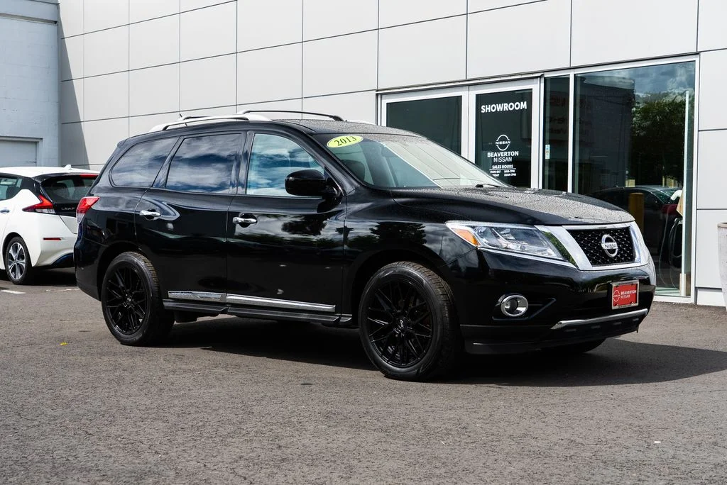Used 2013 Black Nissan Platinum image 1