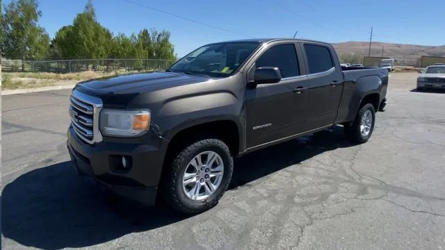 Used 2019 SMOKEY QUARTZ METALLIC GMC 4WD SLE image 4