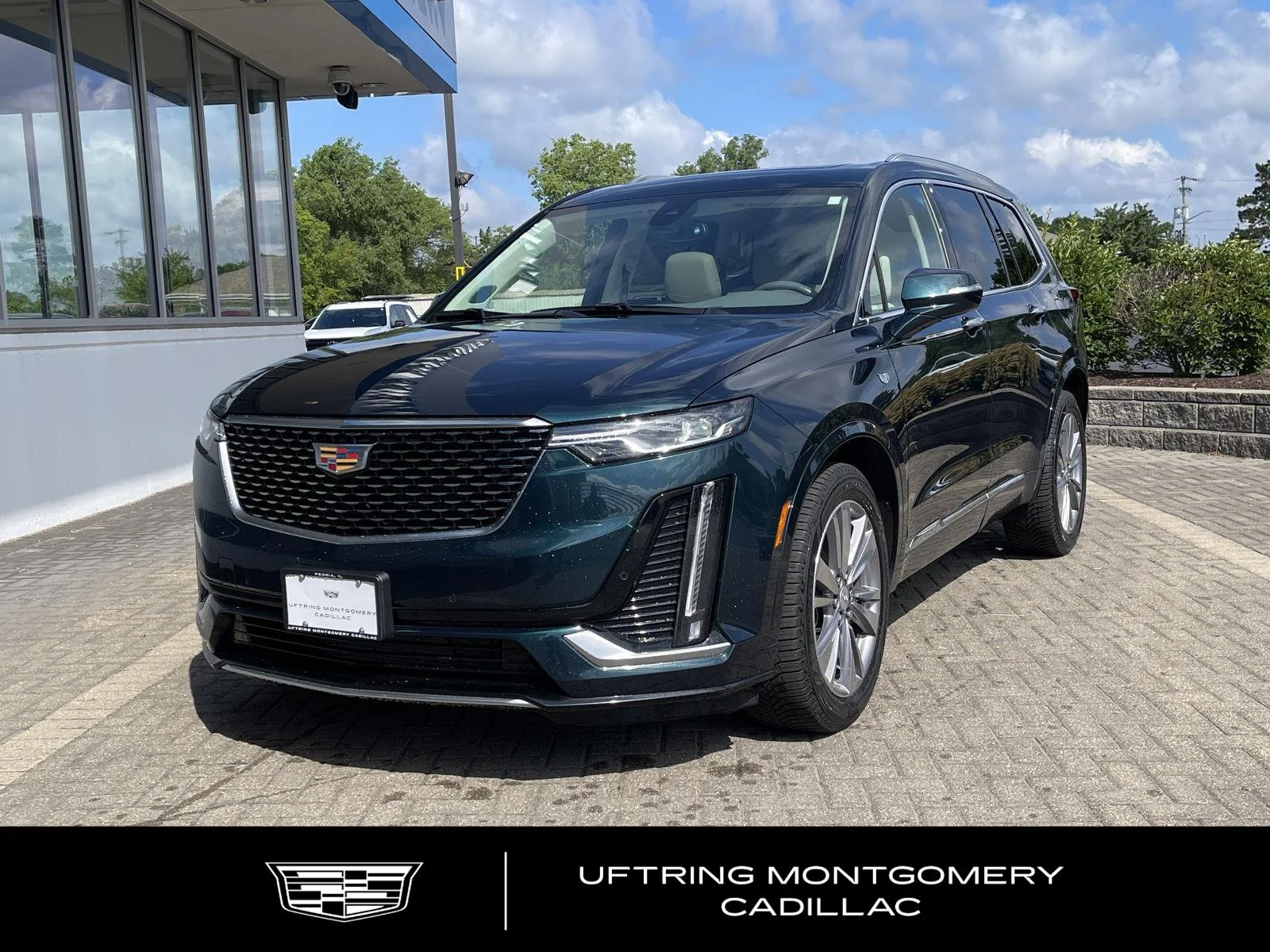 Used 2024 Emerald Lake Metallic Cadillac Premium Luxury image 1