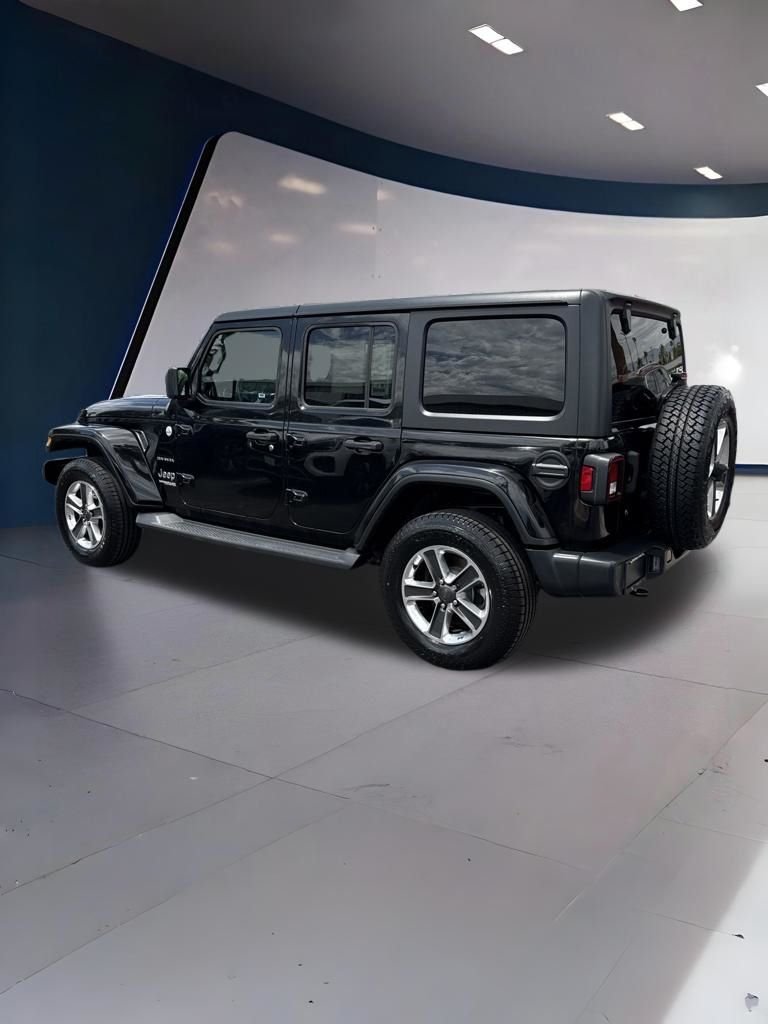 Used 2019 Black Jeep Unlimited Sahara image 4