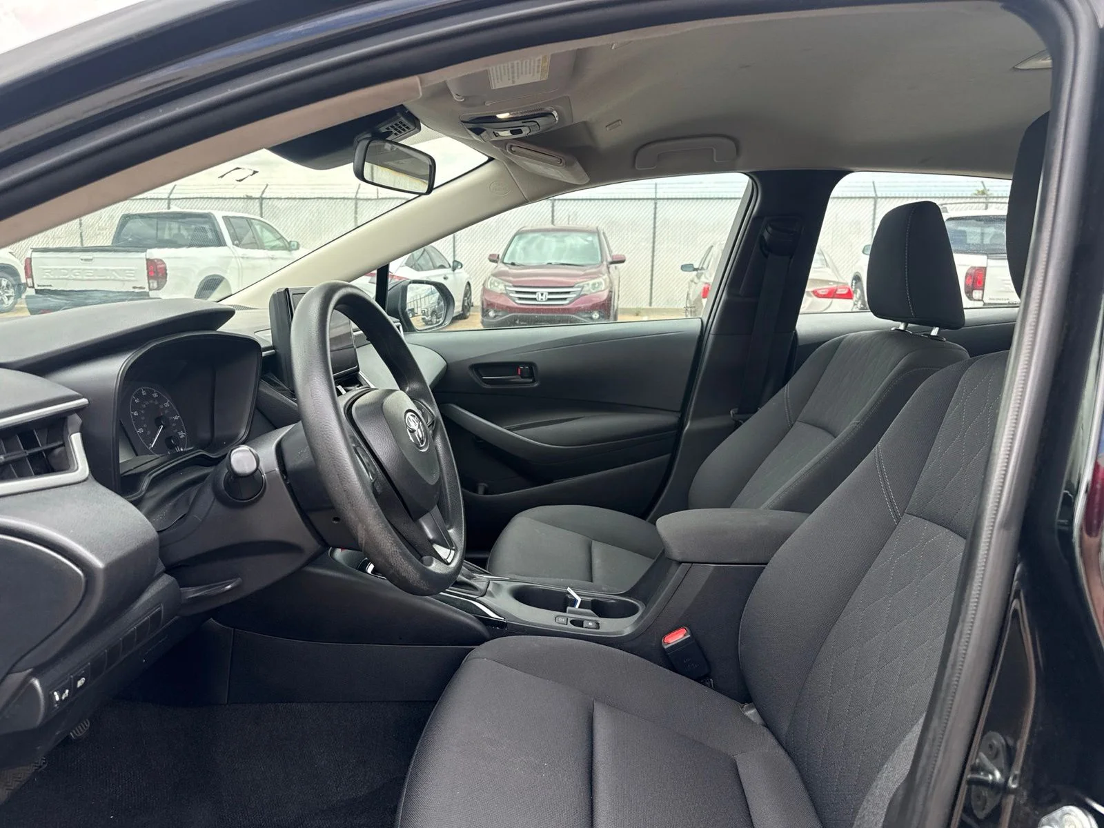 Used 2024 Black Toyota LE image 10