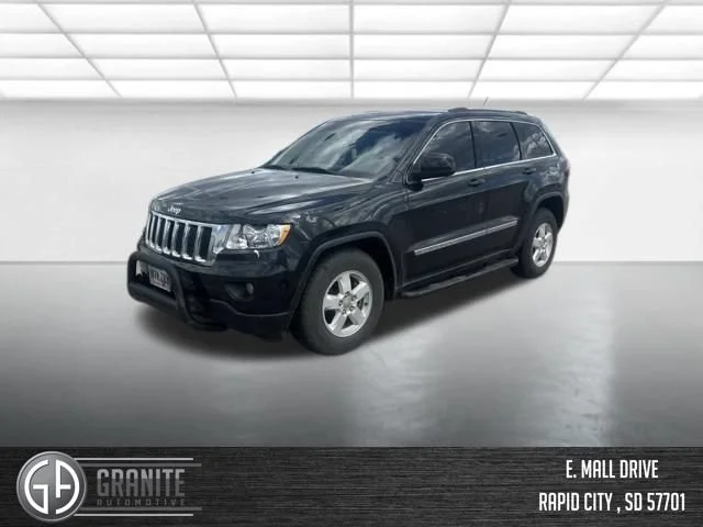 Used 2012 Black Jeep Laredo image 1
