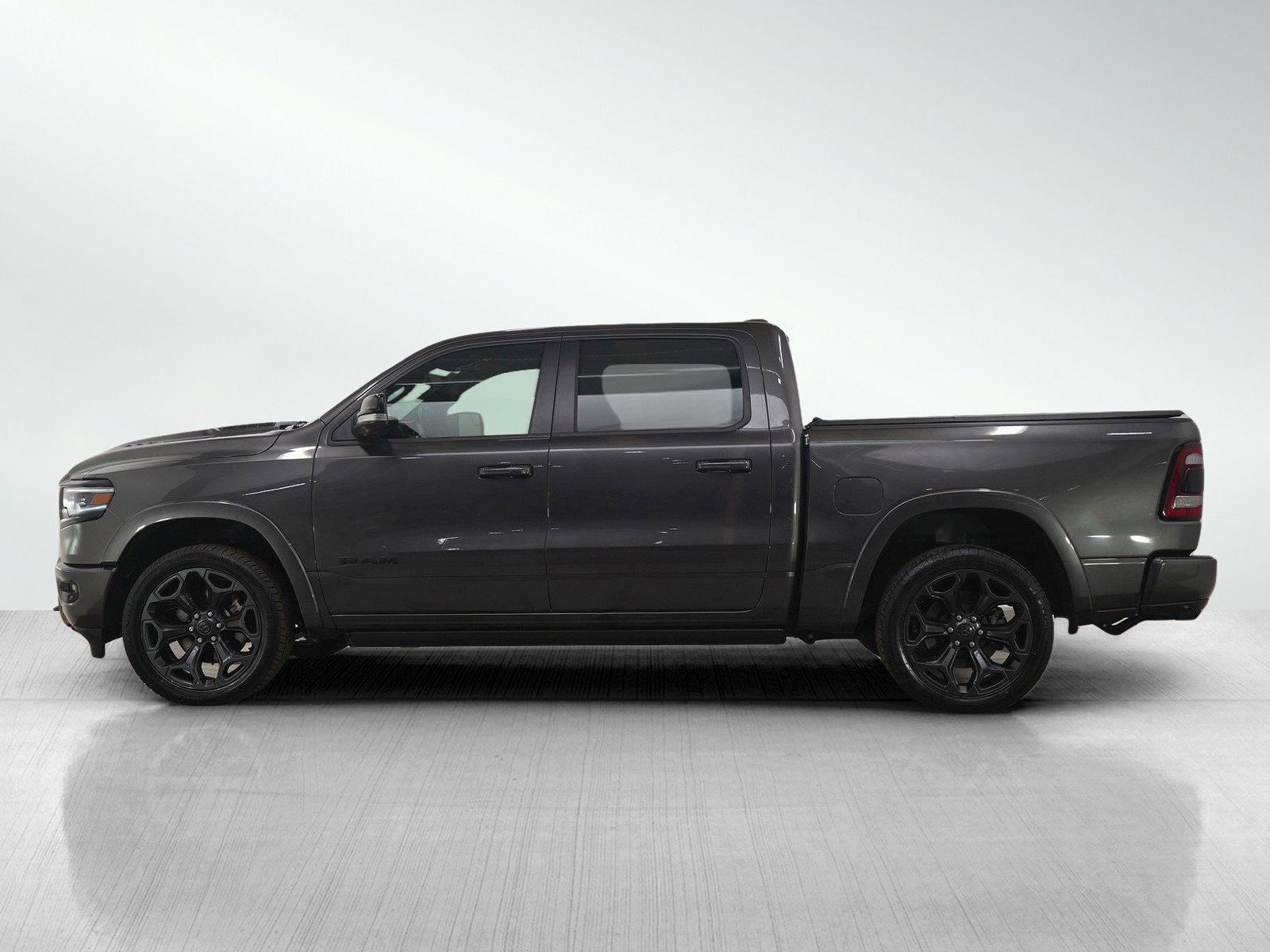Used 2021 RAM Ram 1500 Pickup Limited with VIN 1C6SRFHTXMN555604 for sale in Minneapolis, Minnesota