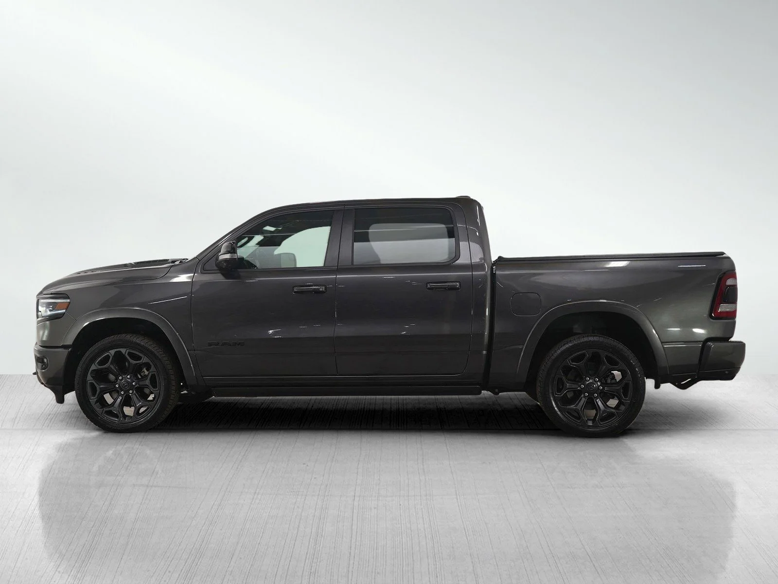 Used 2021 RAM Ram 1500 Pickup Limited with VIN 1C6SRFHTXMN555604 for sale in Minneapolis, Minnesota