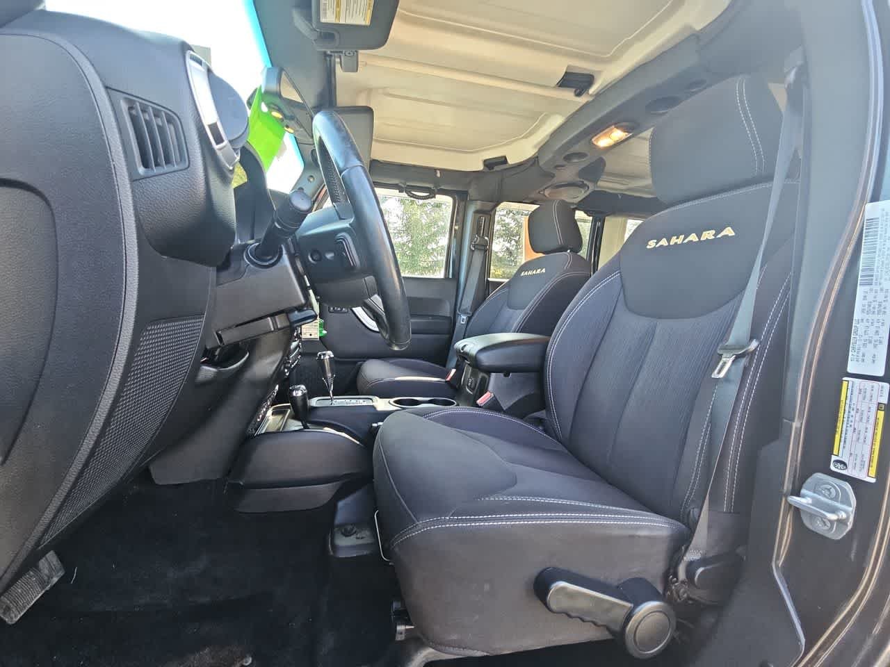 Used 2014 Black Clear Coat Jeep Sahara image 12