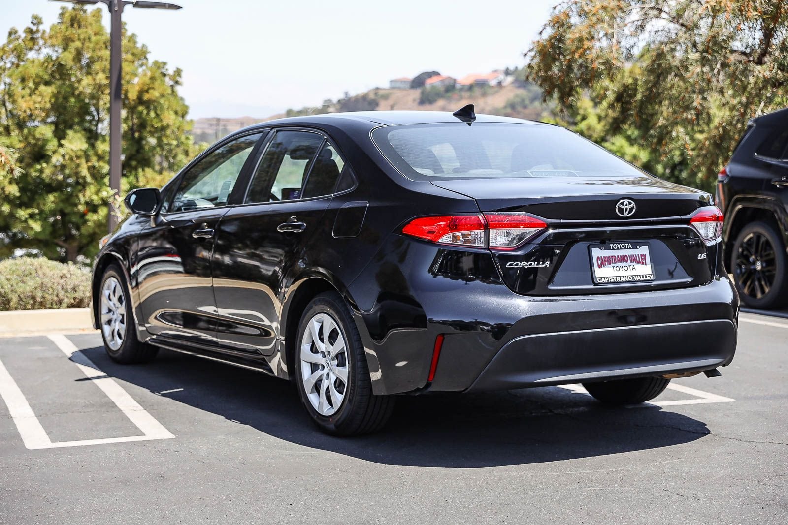 Certified Used 2024 MIDNIGHT BLACK METAL Toyota LE image 6