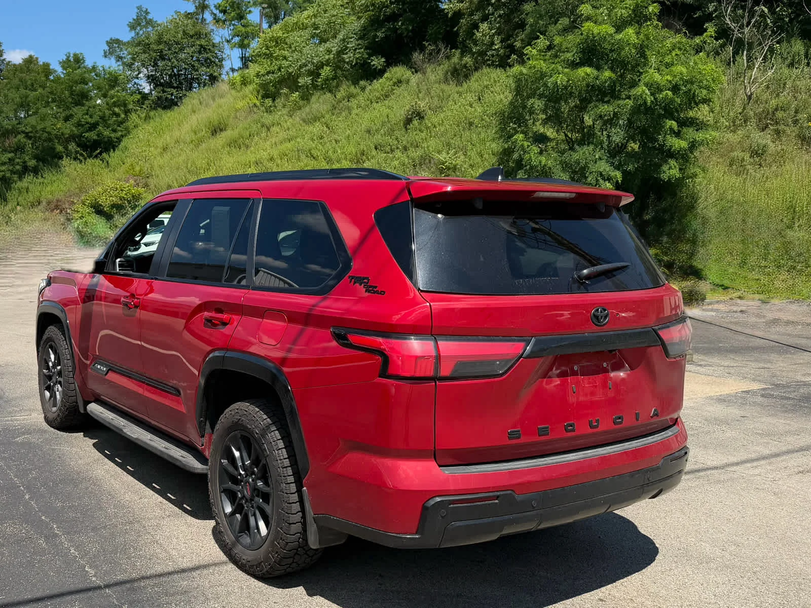 Used 2024 Supersonic Red Toyota Platinum image 5