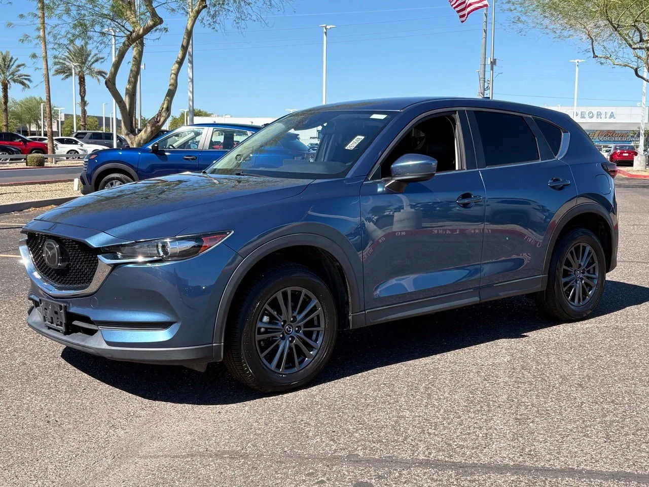 Used 2021 Eternal Blue Mica Mazda Touring image 1