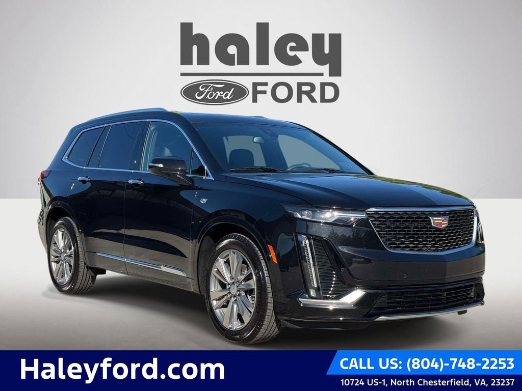 Used 2024 Black Cadillac Premium Luxury image 1
