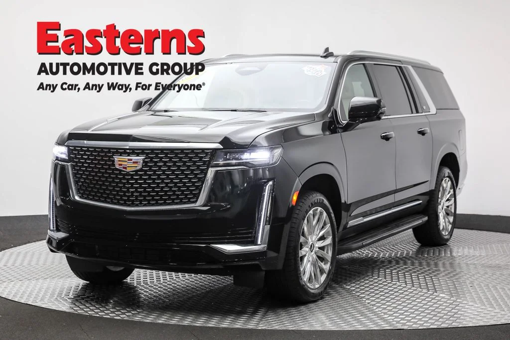 Used 2023 Black Cadillac Premium image 1