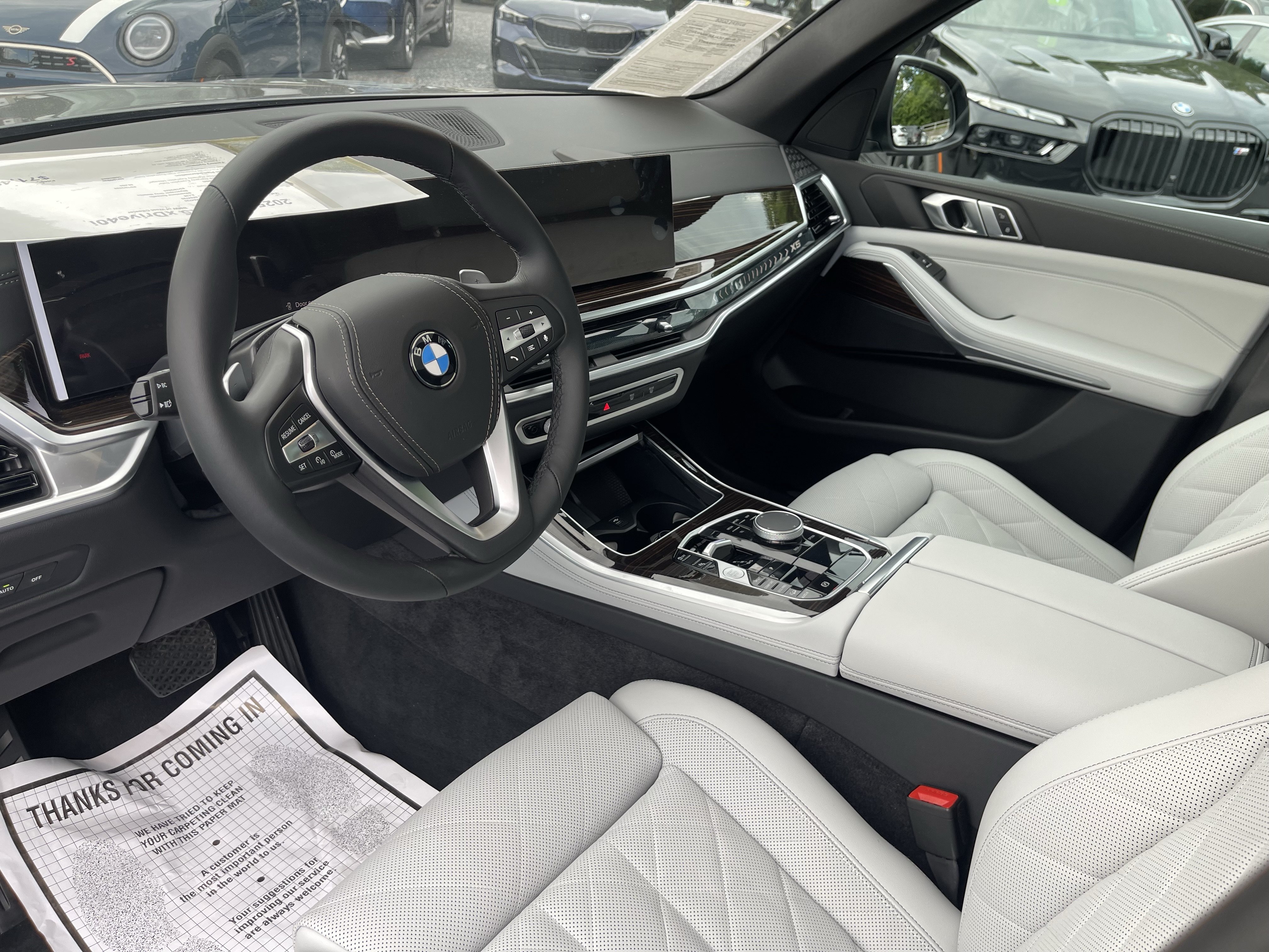 Certified Used 2025 Skyscraper Grey Metallic BMW xDrive40i image 11
