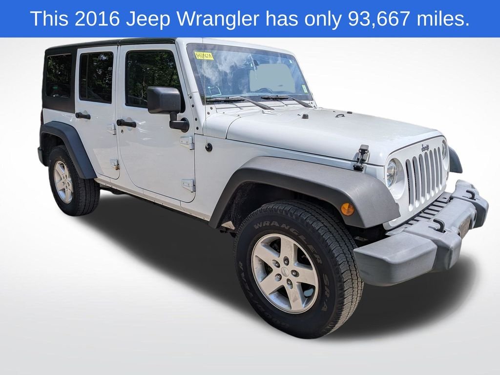 Used 2016 White Jeep Unlimited Sport image 1